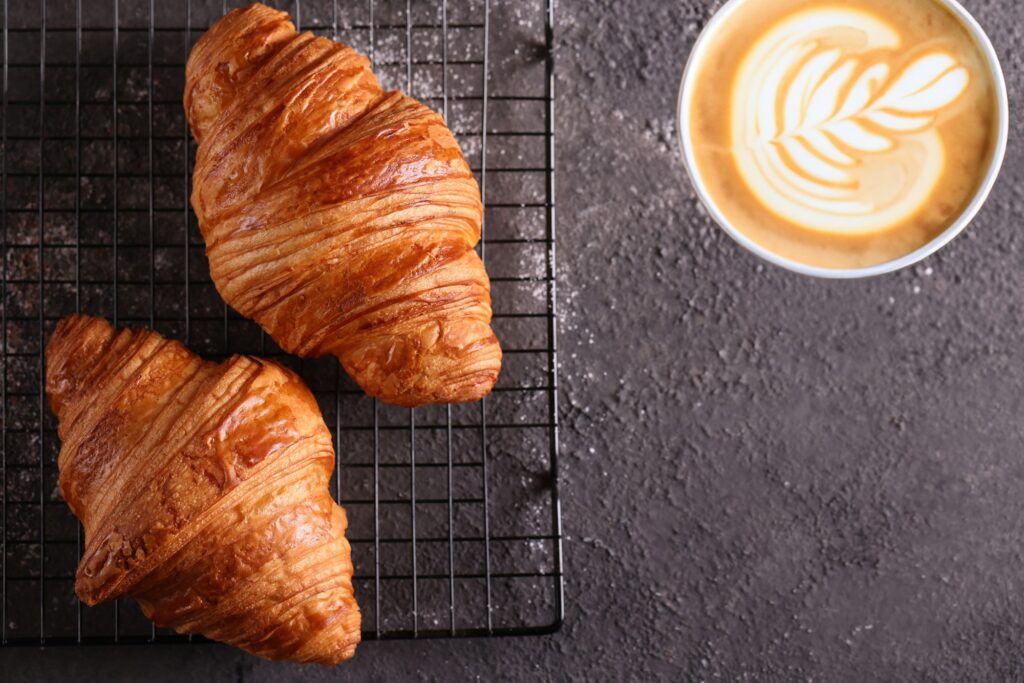 breakfast with fresh croissants and coffee